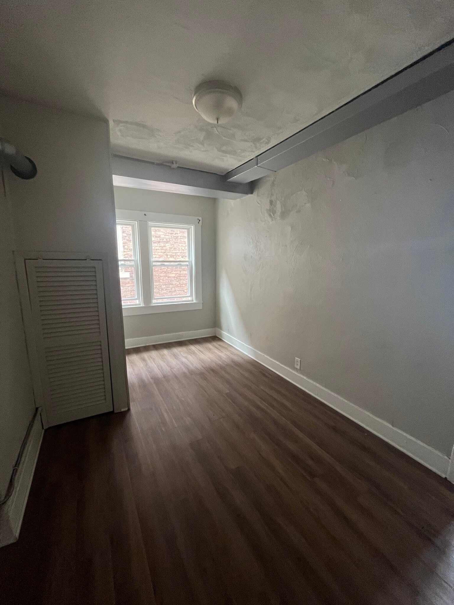 Either a dining room or living room. - 2004 E 125th St
