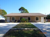 Building Photo - WELL MAINTAINED FLORIDA SHORES 2BR 1BA DUPLEX FOR RENT