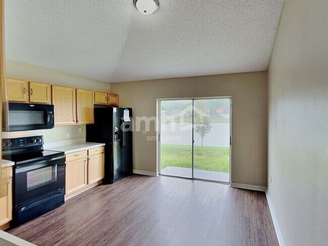 Building Photo - 6606 Gentle Oaks Dr N