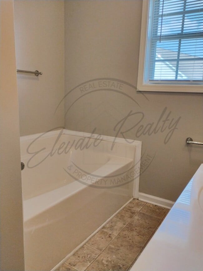 Building Photo - ON SPECIAL! THIS PROPERTY HAS A 1/2 OFF TH...