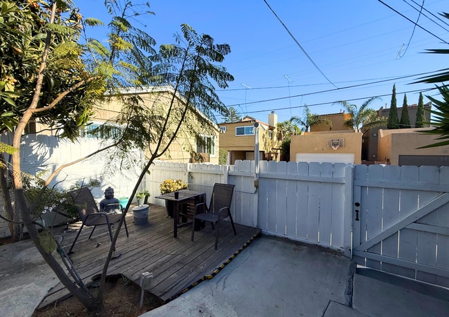 Building Photo - Cozy 2BR with Serene Courtyard Escape