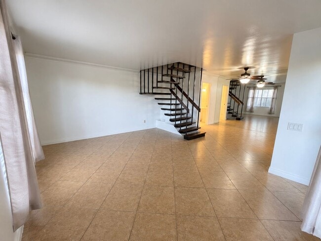 Building Photo - Spacious 3 Bedroom 2 Bathroom Town-Home with In-Unit Laundry, Pool and 2 Parking Spaces!