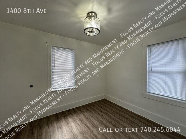 Building Photo - 1400 8th Ave