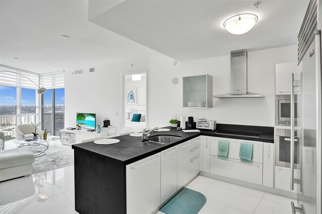Building Photo - 18201 Collins Ave