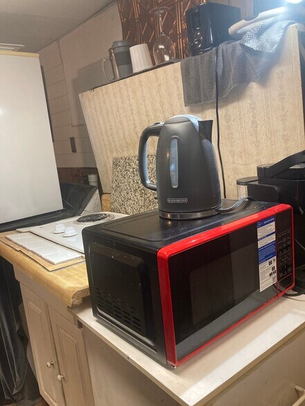 Cabinet for microwave - 764 Lenore Ln