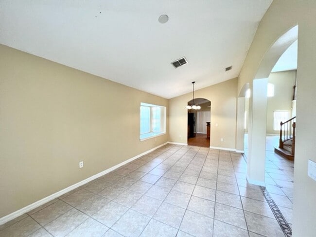 Building Photo - EAGLE CREEK LAKE NONA! WELCOME HOME! Beautiful water views! Spacious 2 story-3 bedroom 2.5 bath h...