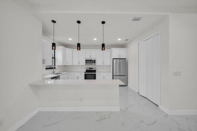 Building Photo - Be the first in occupy this 2026 constructed home in the city of Port Charlotte FL! Qualify for a...