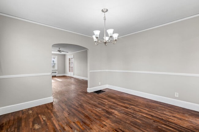 Building Photo - SW, Large Brick Two Bedroom PLUS Two Sun-Rooms, Hardwoods, LR & Separate DR, Fire Place!