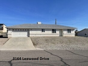 Building Photo - North side home, pet friendly with fenced back yard.