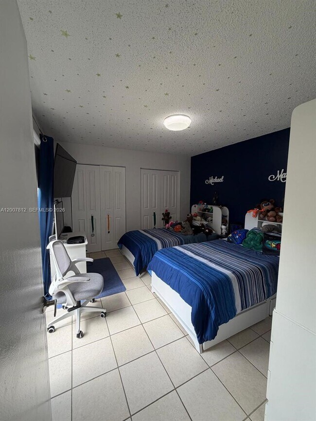 Building Photo - 6580 W 24th Ct