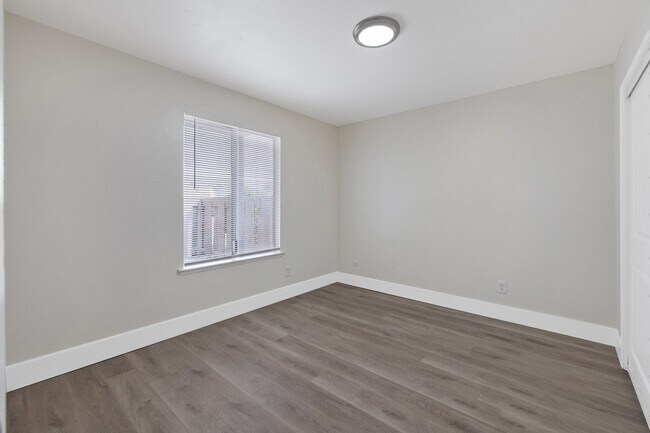 Building Photo - Upstairs unit Available Soon!