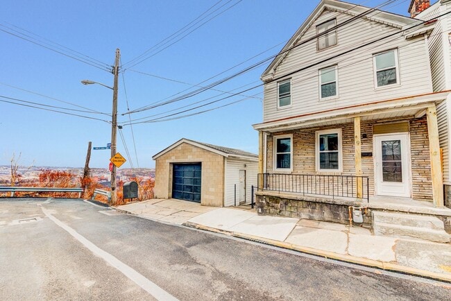Building Photo - Available JULY 2026  - RENOVATED 3 Bedroom Home w/ Garage, City Views + MORE!