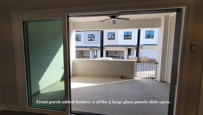 Building Photo - End-unit townhome with plenty of extra windows! Gated Community.