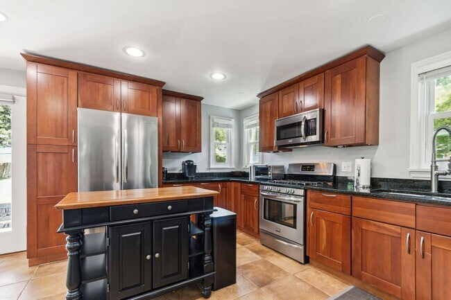 Building Photo - Cute Cape Cod Close to Forest Glen Metro w/huge backyard!
