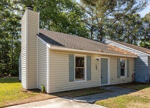 Building Photo - Welcome to Village Cedars!