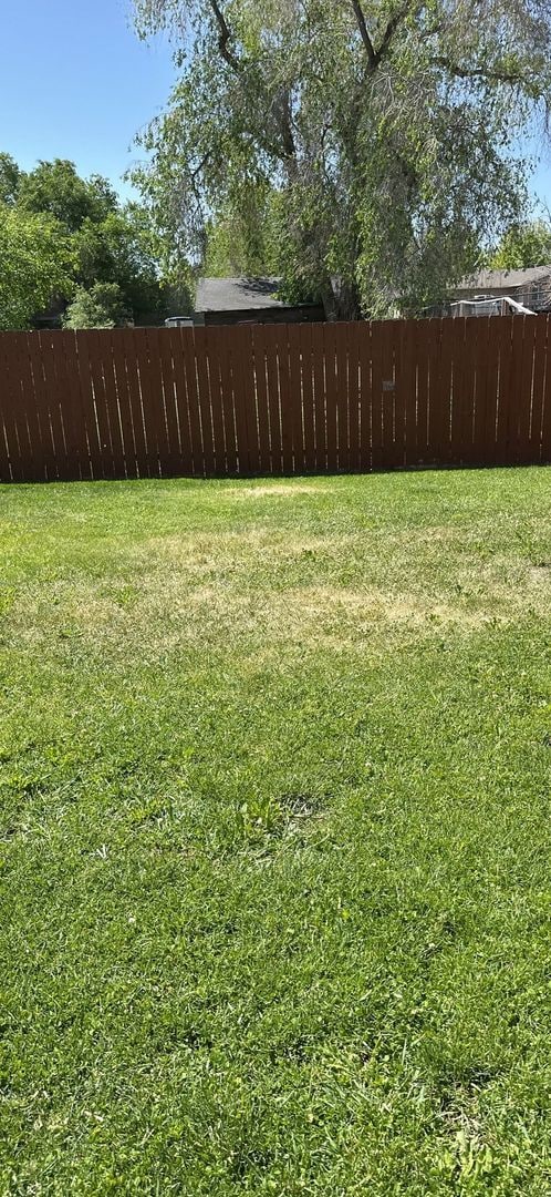 Building Photo - 2 Bed Duplex with Fenced Yard, Covered Patio & Water Included