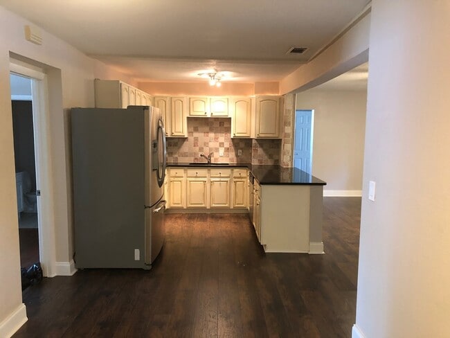 Building Photo - ** Move in Special $500 off your first months rent** WONDERFUL 4 Bedroom/3 Bathroom Home in the M...