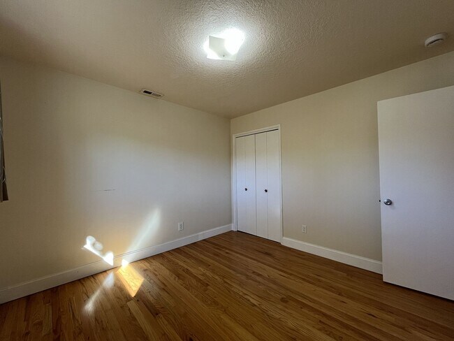 Building Photo - Light-Filled Home with Open Layout, Modern...