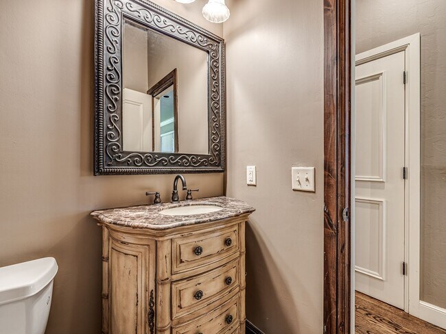 Building Photo - Luxury Edmond Townhome Overlooking Waterfa...