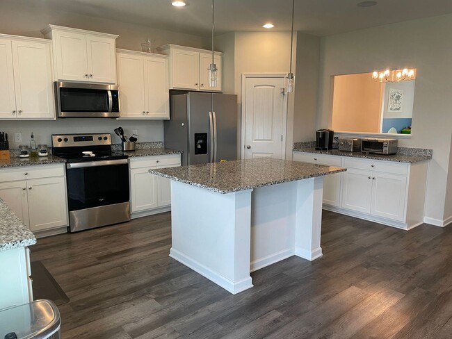 Building Photo - Stunning 4BR Home with Fenced Yard, Loft & Luxury Finishes in Elgin! Available July 1st!