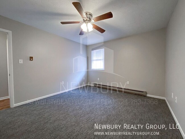 Building Photo - Spacious 2-Bedroom Apartment in a Serene C...