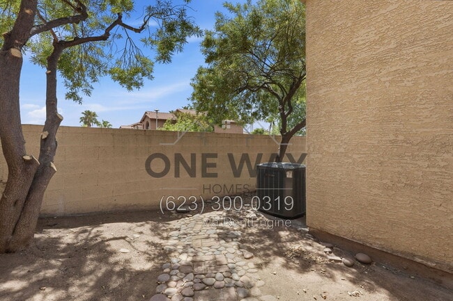 Building Photo - 5704 E Aire Libre Ave