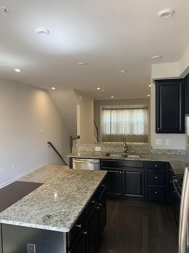 Building Photo - Modern 2BR + Office Townhome with Garage &...