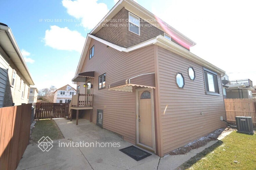 Building Photo - 2418 N 75th Ct