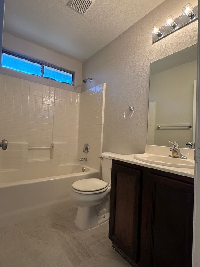 Building Photo - 1 story home, 3 bedrooms, 2 bathrooms, 2 c...