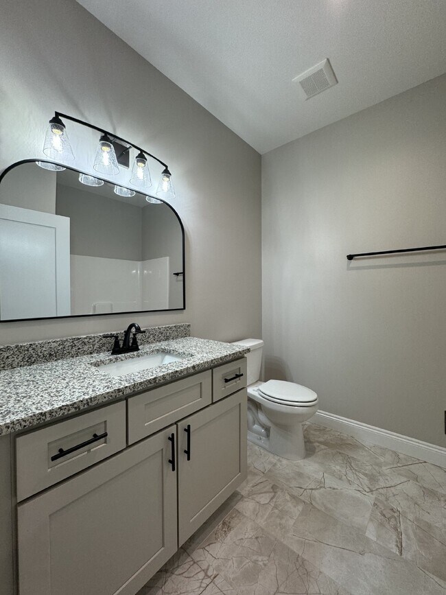 Building Photo - "Charming 4 Bed, 2 Bath Home with Granite ...