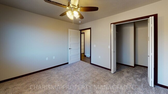 Building Photo - 2 BEDROOM, 1 BATH TOWN HOME, INDIVIDUAL ENTRANCE, ATTACHED GARAGE, PET FRIENDLY, NEWER DEVELOPMENT