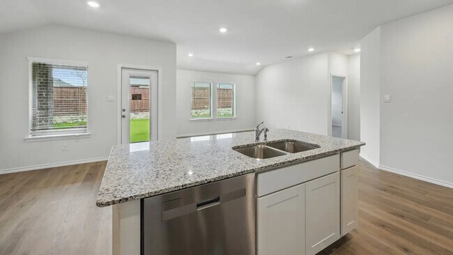 Building Photo - Beautiful new 4-bedroom, 2-bath home with an open floor plan, granite kitchen, two-car garage, an...