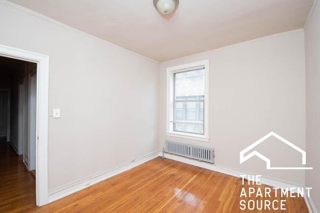 Building Photo - 1365 W Estes Ave