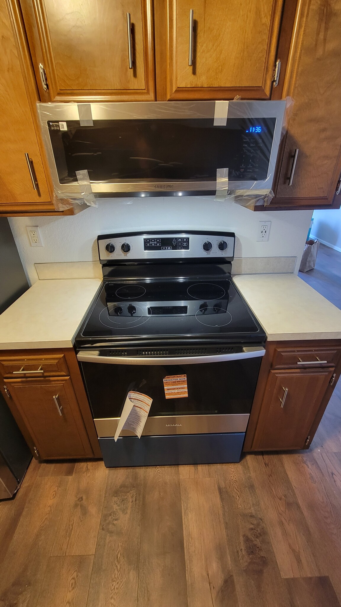 New range and new microwave - 2625 13th Avenue West