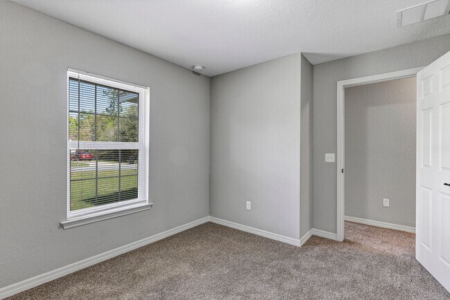 Building Photo - Freshly Painted 3BR Home with Spacious Yard, Modern Baths & No Deposit Option!