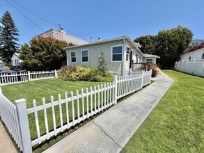 Building Photo - Large Private Yard, New Flooring & Free Laundry in Renovated 1BD