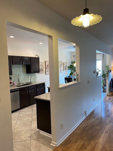 Looking from the basement door: kitchen and dining room. - 9 Daytona Beach Dr