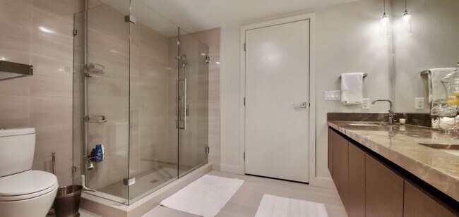 Building Photo - One of kind 7th terrace unit in reputable ...