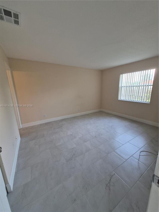 Building Photo - 10905 Royal Palm Blvd