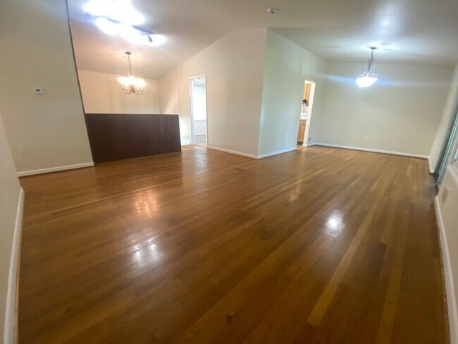 Building Photo - PRICE REDUCTION! A spacious three bedroom/...