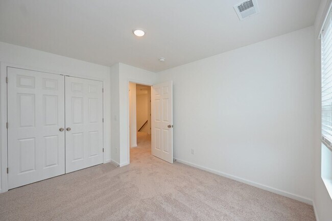 Building Photo - **BE THE LUCKY ONE TO LIVE IN THIS 2024-BUILT BRICK TOWNHOME IN THE VILLAS AT REGAL SQUARE FEATUR...