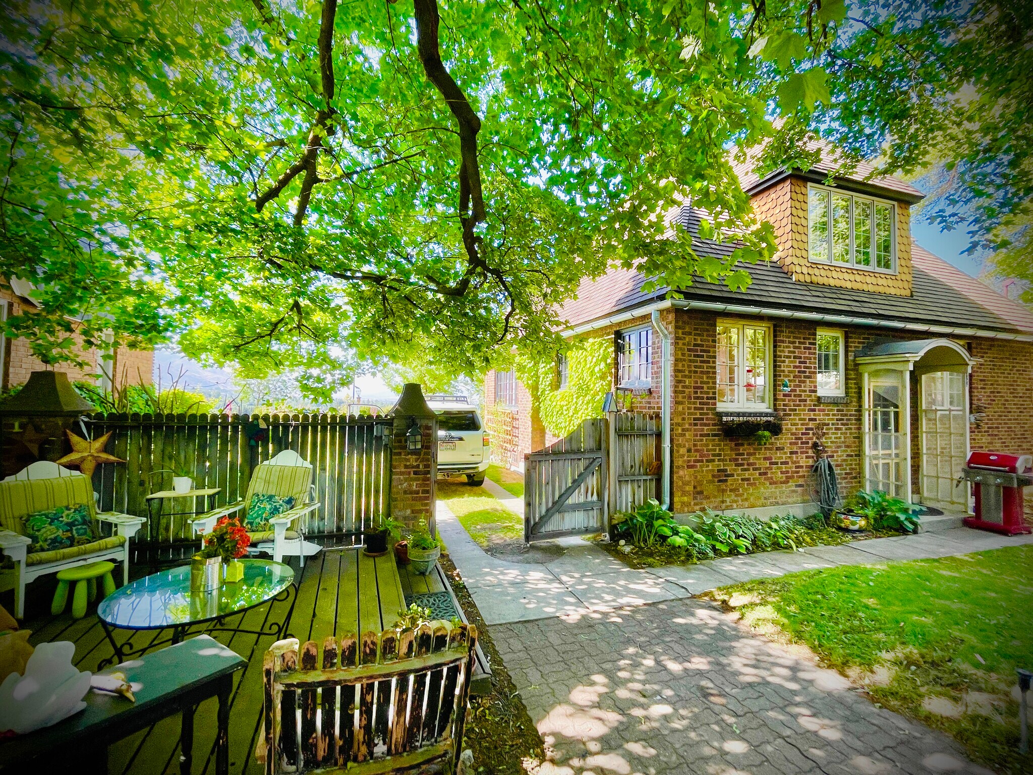 Backyard is sweet, I left yard furnishings, & the trees make a perfect shaded canopy. - 483 Boulevard