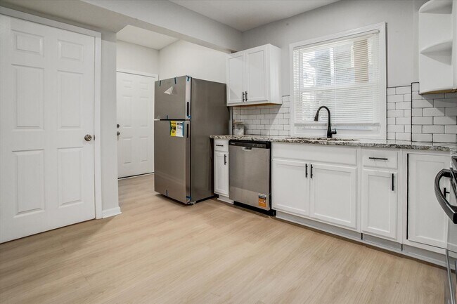 Building Photo - Move fast on this one. Apply within 24 hours of your showing and lock in $250 off your monthly re...