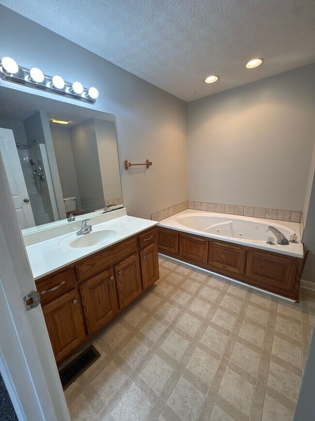 Building Photo - Charming Home with Covered Back Deck and Fenced in Yard...