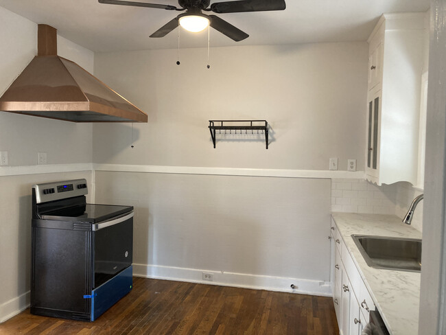 The 1940s VentaHood is fully functional in a spacious kitchen - 266 Post Ave