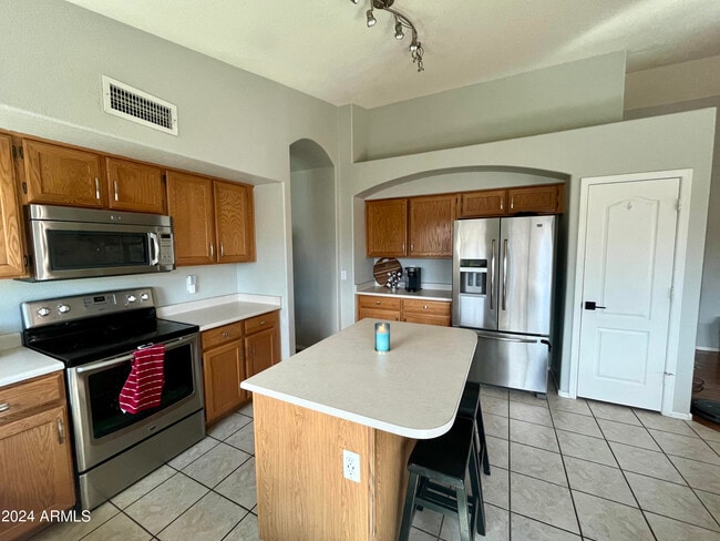 Building Photo - 6471 W Adobe Dr