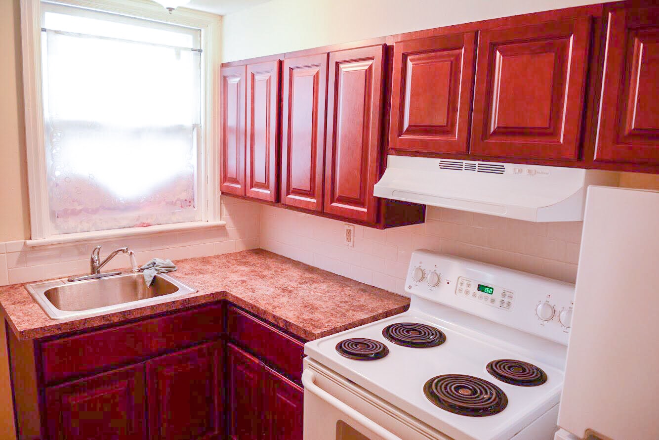 The newly remodeled kitchen also includes new appliances. It also features generous pantry and cupboard space. - 675 Spring Garden St