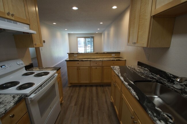 Building Photo - Modern First-Floor One Bedroom with In-Unit Laundry