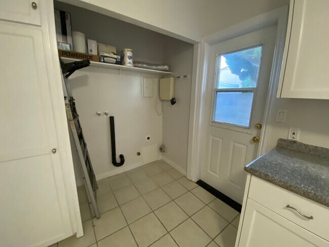 laundry hookups and back door - 4164 Howard Ave