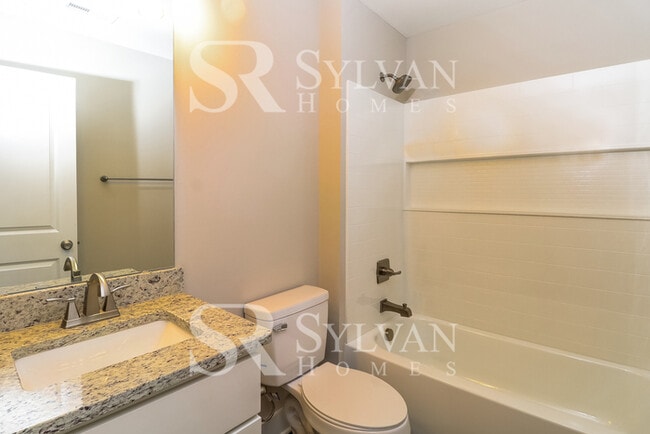 Building Photo - This lovely 3BR, 2.5BA home is move-in ready